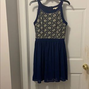 A navy blue and gold dress.